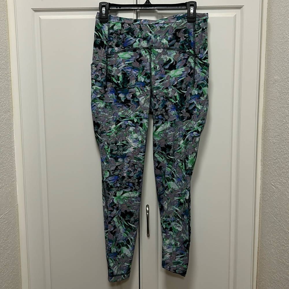 Lululemon pocketed running leggings.  3/4 length